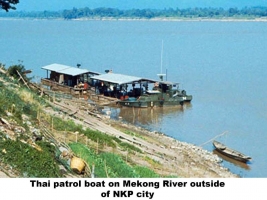 Mekon River embankment at NKP City with Thai patrol boat